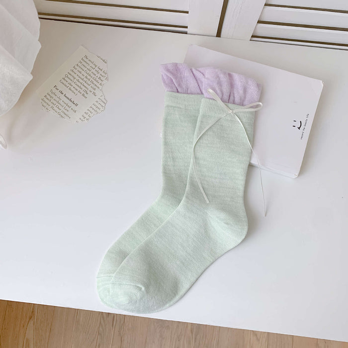 Wholesale Colorful bow tie pile socks, cute and versatile socks