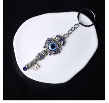 Wholesale Blue Eye Pendant Flower Butterfly Keychain Pendant Bag