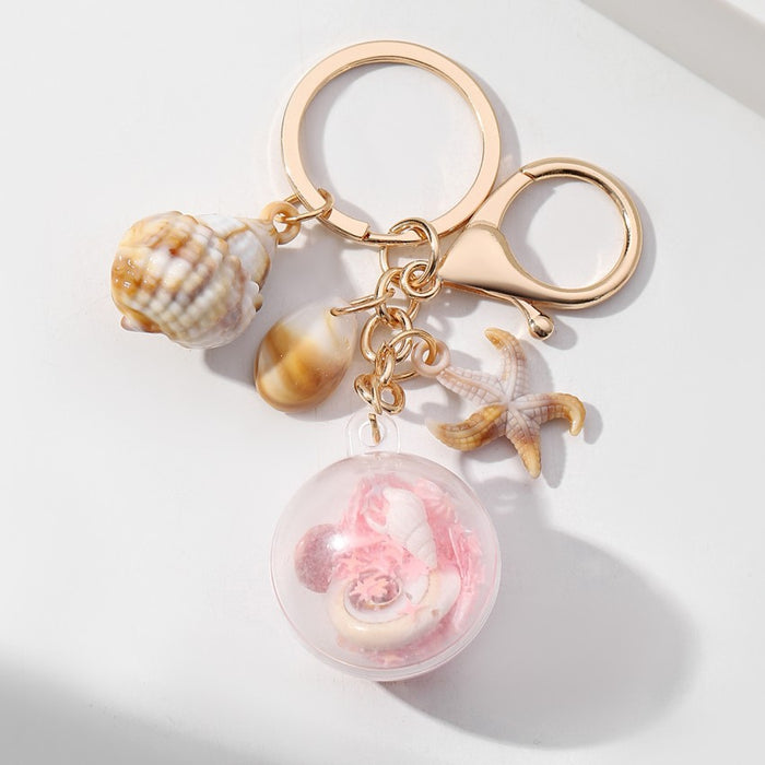 Wholesale Luminous Conch Sequin Small Ball Acrylic Keychain JDC-KC-RongRui055
