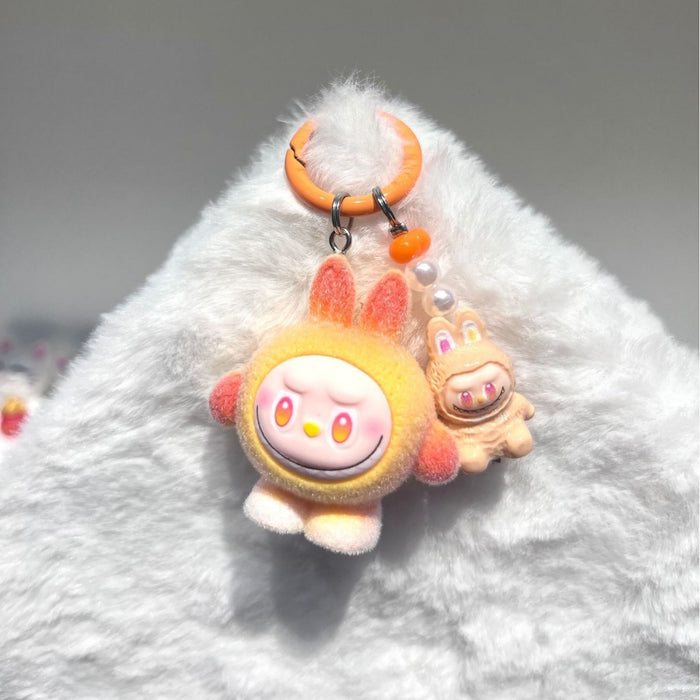 Wholesale Flocked egg boy pull cloth high value cute mini doll ornaments pendant three-dimensional resin accessories