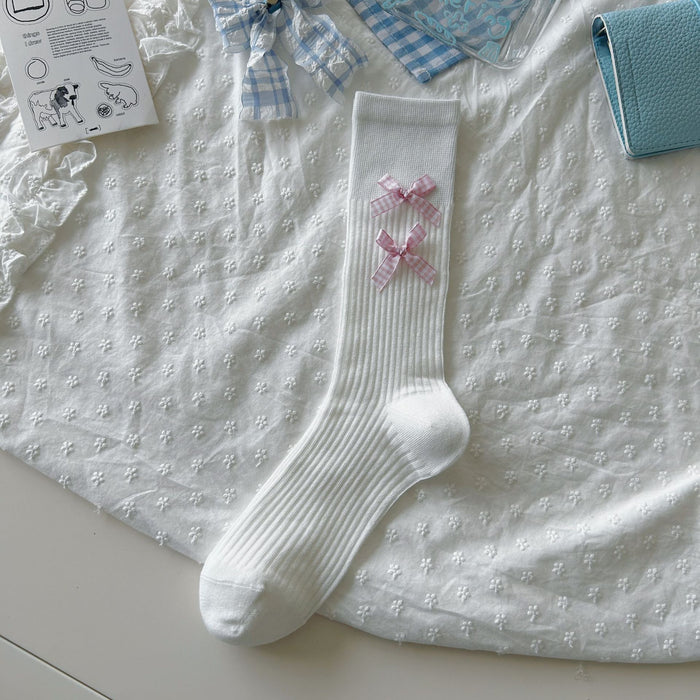 Wholesale Bow tie socks, long tube pile socks