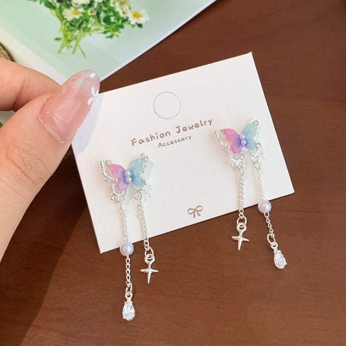 Wholesale Resin pearl butterfly earrings with tassels and silver needles, sweet temperament, light luxury, high-end feel, versatile earrings