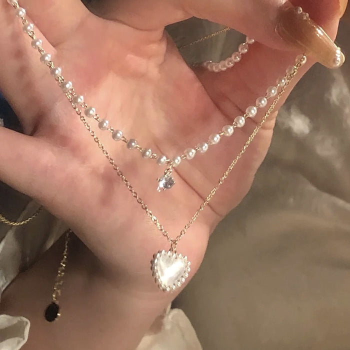 Wholesale A niche high-end pearl double-layer layered necklace with personalized heart pendant and collarbone chain