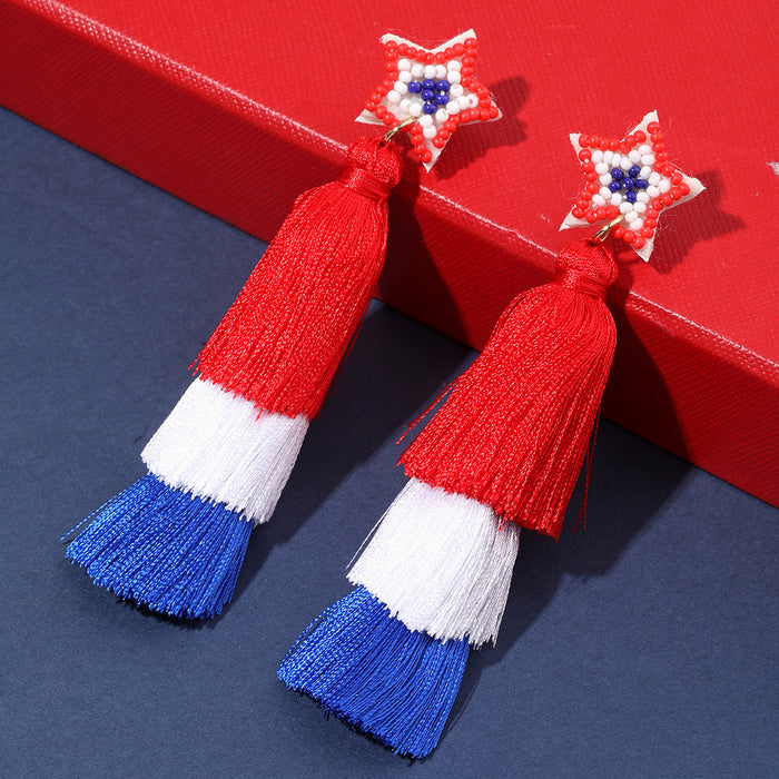 Wholesale Red, blue, and white rainbow shaped woven cotton rope tassel with sparkling pink acrylic earrings