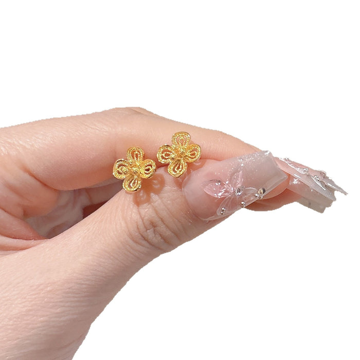 Wholesale Sand gold hollowed out exquisite flower earrings, niche temperament earrings, high-end and versatile earrings