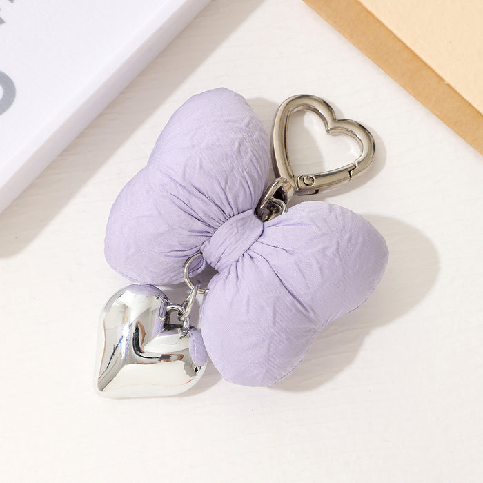 Wholesale Creative new cute bow pendant with high-end metal heart keychain decoration