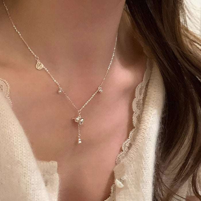 Wholesale Minimally designed silver tassel heart-shaped necklace with light luxury and niche design pendant