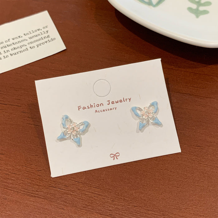 Wholesale Sweet and exquisite butterfly cherry blossom pearl earrings with silver needles, niche design, high-end and versatile earrings