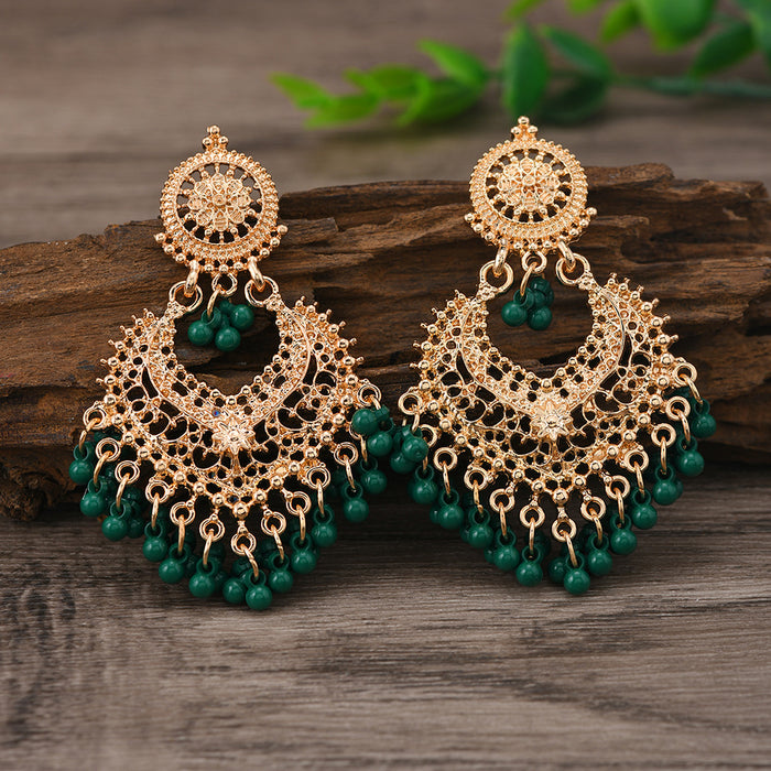 Wholesale Retro Bohemian ethnic style earrings for women exaggerated temperament hollow heart earrings long bell India