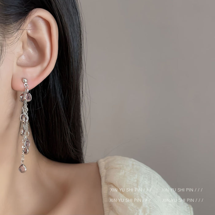 Wholesale Round bead irregular tassel earrings with high-end design and exquisite long earrings