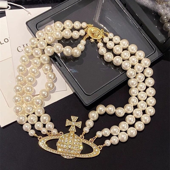 Wholesale Saturn-set diamond three-strand pearl necklace