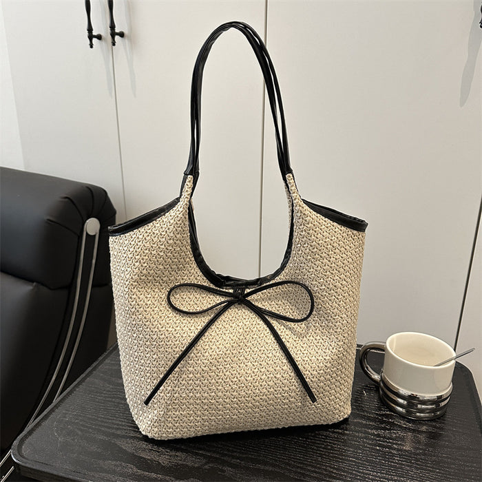 Wholesale Small and niche bow woven bag, hand-held single shoulder crossbody bag, large capacity tote bag