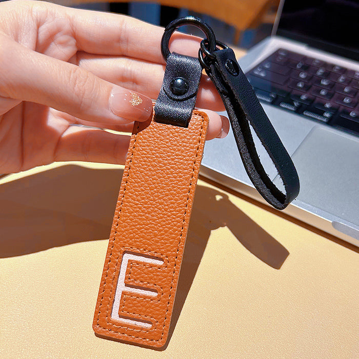 Wholesale 26 English Letter Text Plate Leather Keychain JDC-KC-WWX004