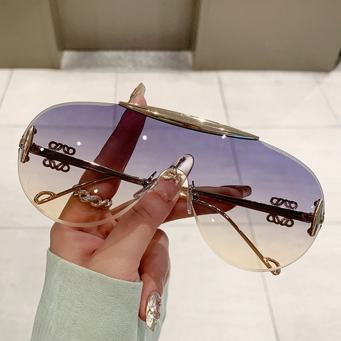 Wholesale Frameless sunglasses, personalized one-piece large frame, fashionable and high-end sunglasses