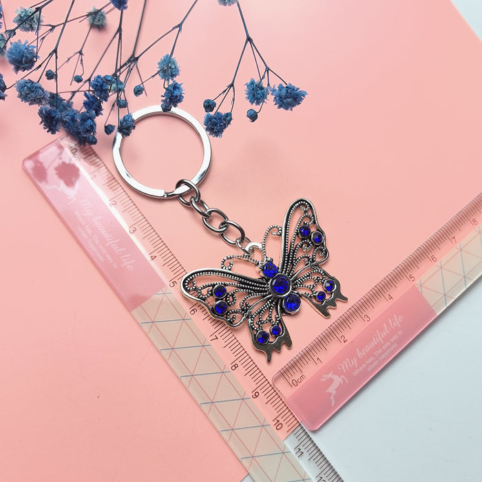 Wholesale Blue Eye Pendant Flower Butterfly Keychain Pendant Bag
