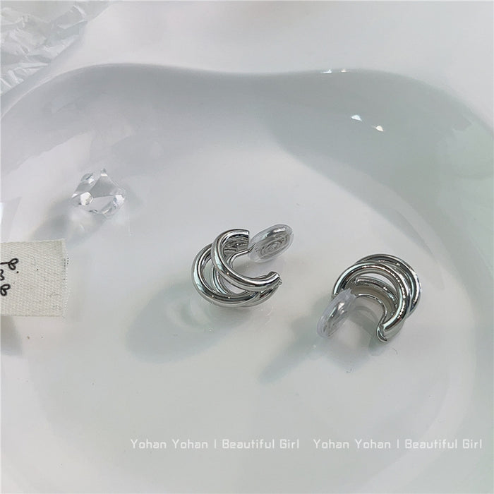 Wholesale Metallic ear clip earrings with a sense of luxury, simplicity, and temperament. Earrings with circular rings and no ear holes for women, painless