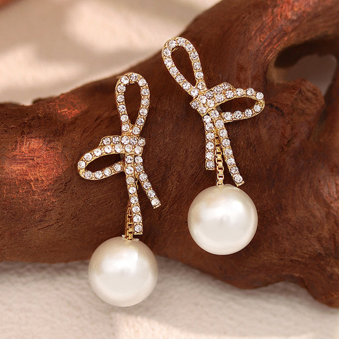 Wholesale Pearl earrings new niche design temperament earrings simple and versatile bow earrings