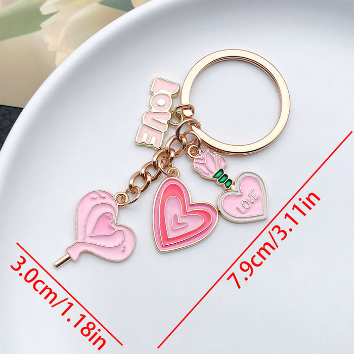 Wholesale Cute pink heart-shaped rose potion metal  keychain