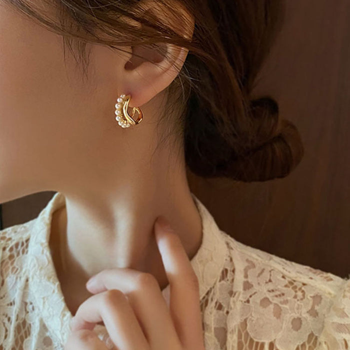 Wholesale Irregular double-layer pearl earrings with feminine temperament, plain face earrings, silver needles