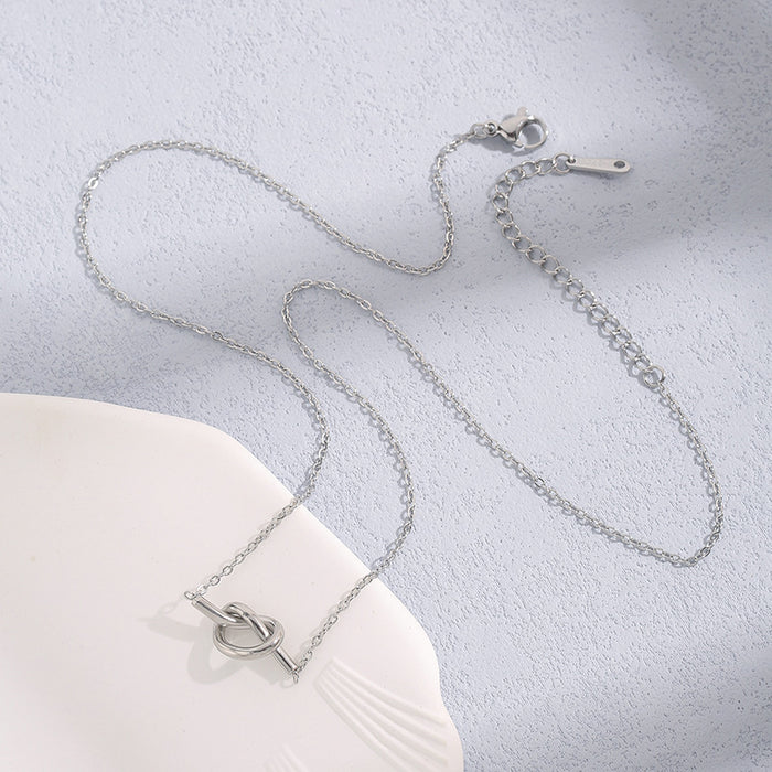 Wholesale Cross border new niche knot double heart winding pendant titanium steel O-shaped necklace simple and fashionable temperament exquisite