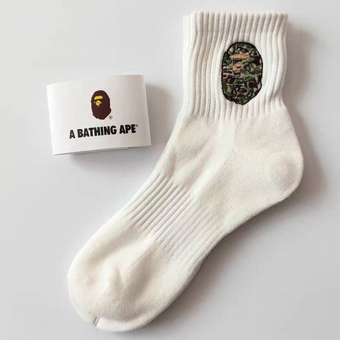 Wholesale Medium length towel bottom socks, high top sports long tube, embroidered white