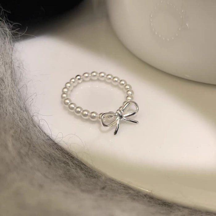 Wholesale Bow pearl ring for women, light luxury, exquisite and high-end index finger ring, adjustable index finger ring