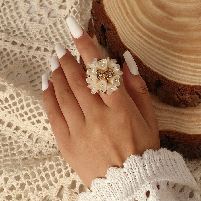 Wholesale fashion jewelry diamond-embedded small flower open ring