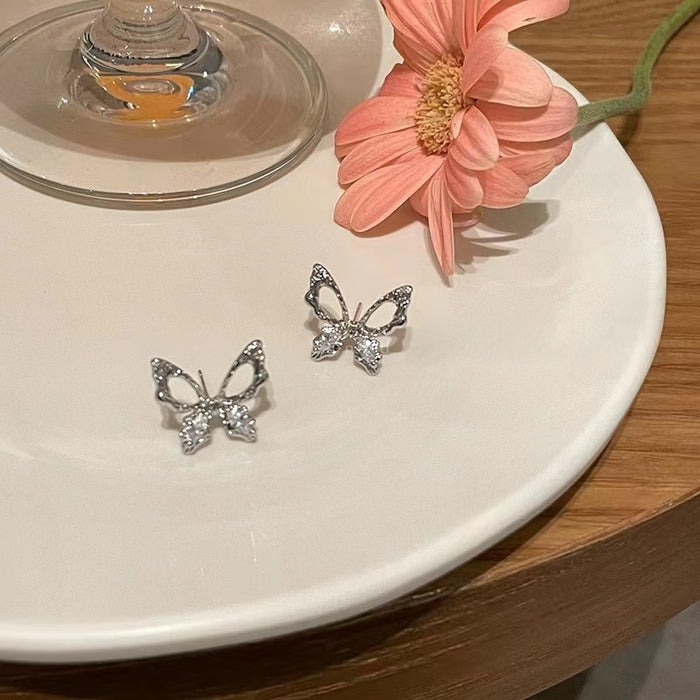 Wholesale Silver needle hollowed out butterfly earrings, niche design, exquisite earrings, high-end fashion, versatile earrings