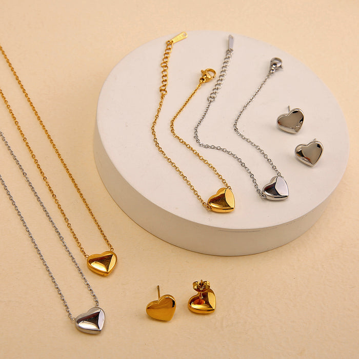 Wholesale Fashion classic stainless steel heart necklace bracelet earrings three piece set wholesale solid pendant