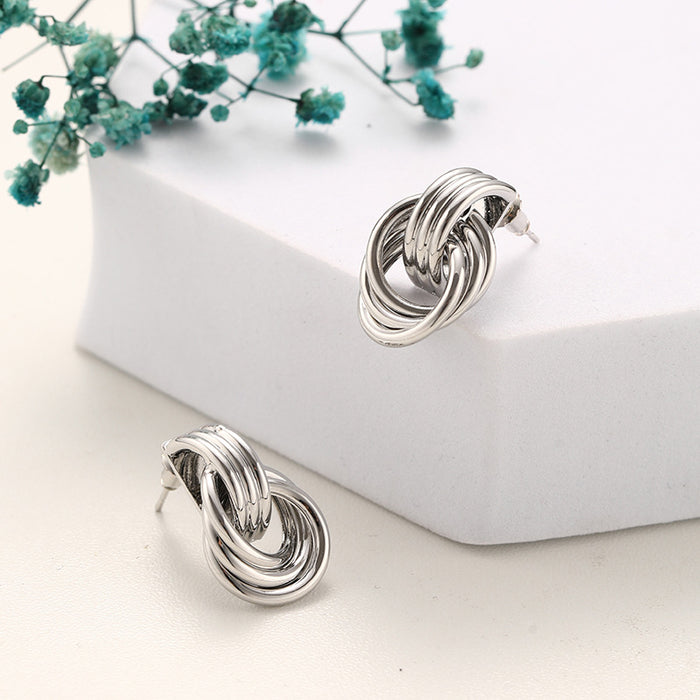 Wholesale Exaggerated double knot earrings, personalized copper plated earrings, niche high-end, light luxury temperament earrings