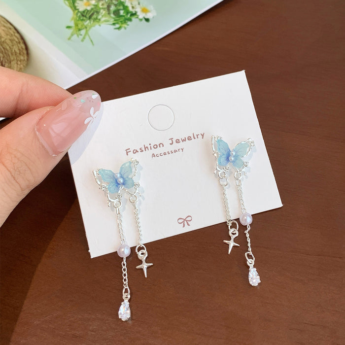 Wholesale Resin pearl butterfly earrings with tassels and silver needles, sweet temperament, light luxury, high-end feel, versatile earrings