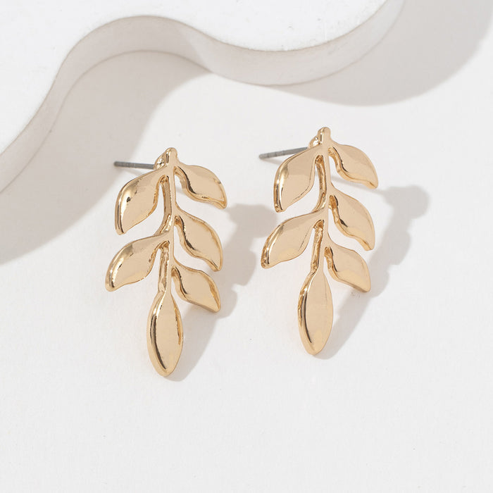 Wholesale Alloy leaf shaped hollowed out earrings metal stud earrings