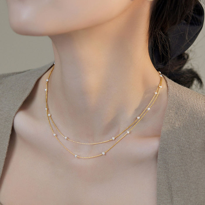 Wholesale Pearl necklace, pearl wrapped gold necklace, versatile and high-end for women, layered and worn