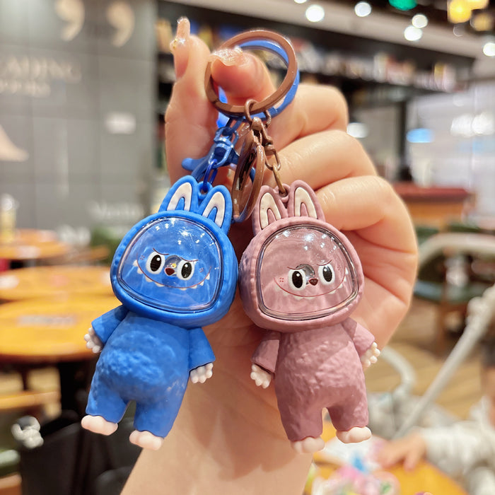 Wholesale Creative cartoon illuminated keychain figurine, car couple bag pendant, student backpack ornament