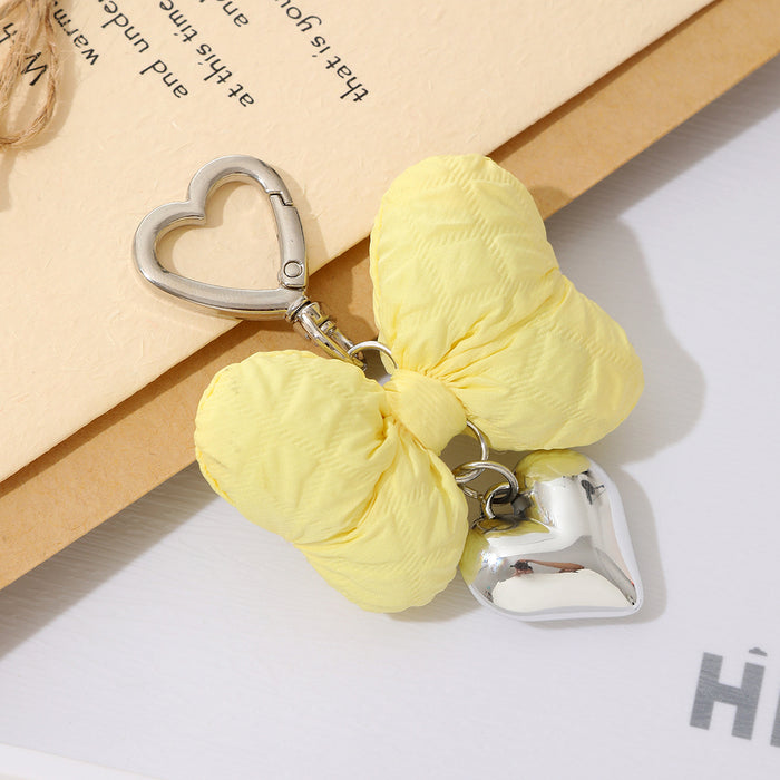 Wholesale Creative new cute bow pendant with high-end metal heart keychain decoration