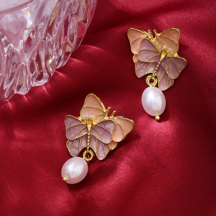 Wholesale Silver needle pearl retro butterfly niche fashion high-end earrings