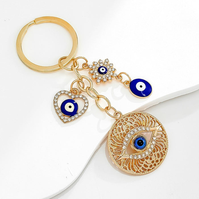 Wholesale Diamond-encrusted blue eyes evil eye tassel keychain