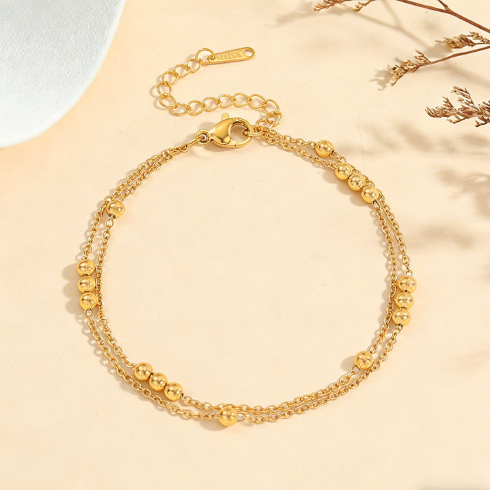 Wholesale 2pcs Luxury multi-layer titanium steel bracelet with delicate gold-tone beads