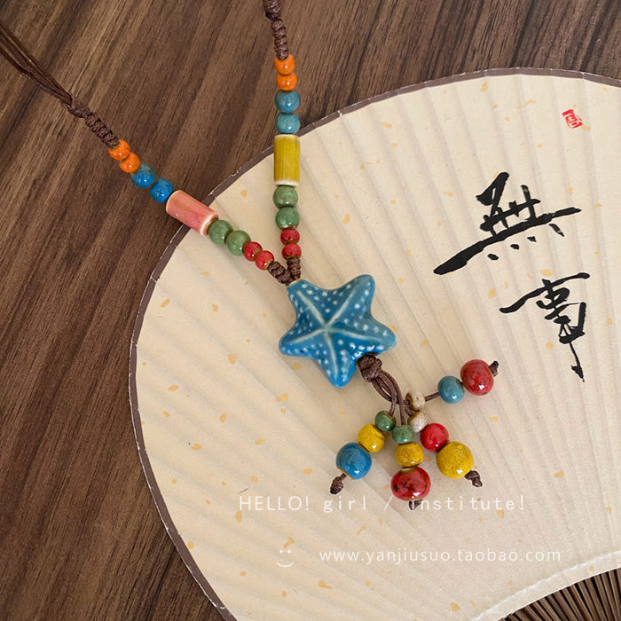 Wholesale Colorful ceramic bead star necklace, long sweater chain accessory