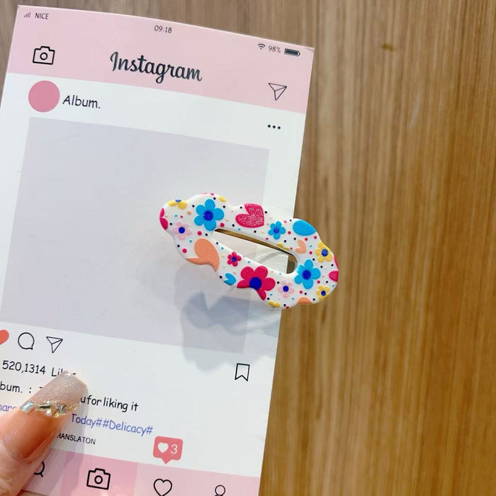 Wholesale Cute kids'  hair clips with various flower patterns