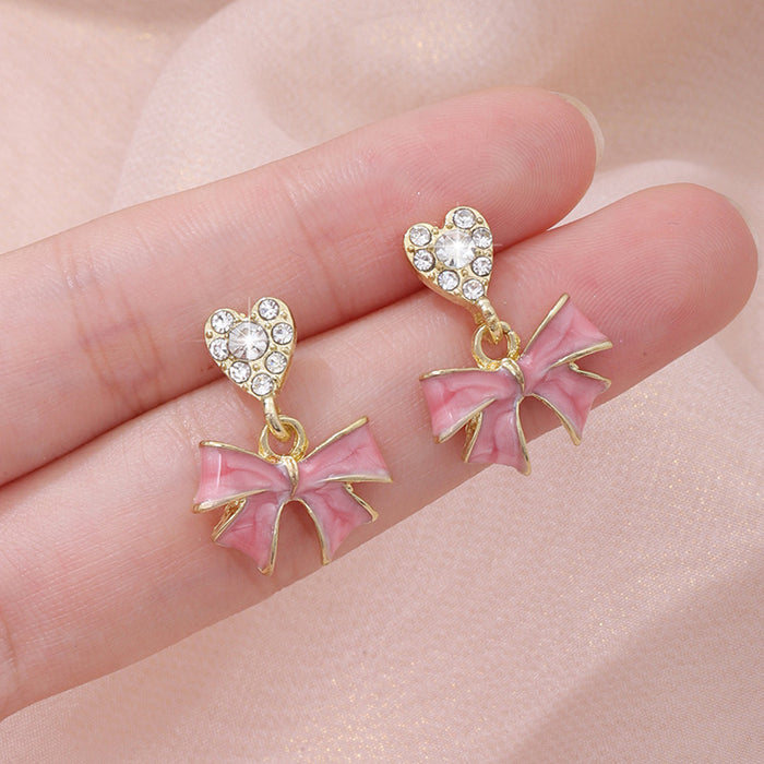 Wholesale Bow painted oil earrings set with diamonds, high-end earrings