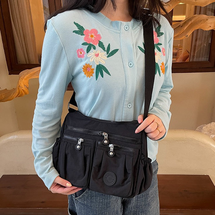 Wholesale Nylon fabric bag women' s urban simple messenger bag lightweight shoulder casual women' s bag