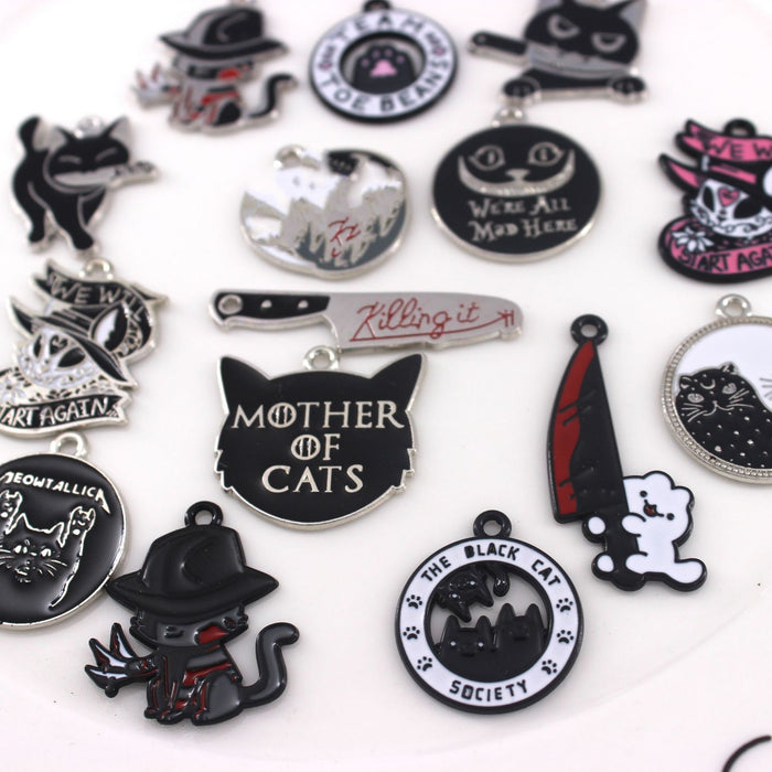 Wholesale 10pcs Cute Black Cat Dagger Alloy Oil Dropping Funny Jewelry Pendant Keychain Pendant Accessories
