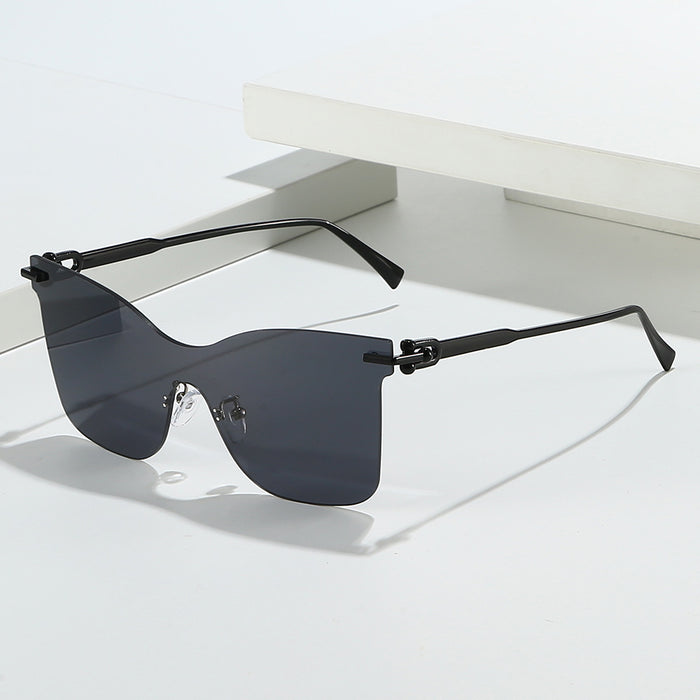 Wholesale Frameless one-piece sunglasses with a high-end feel, personalized trendy glasses, UV resistant cat eye retro sunglasses