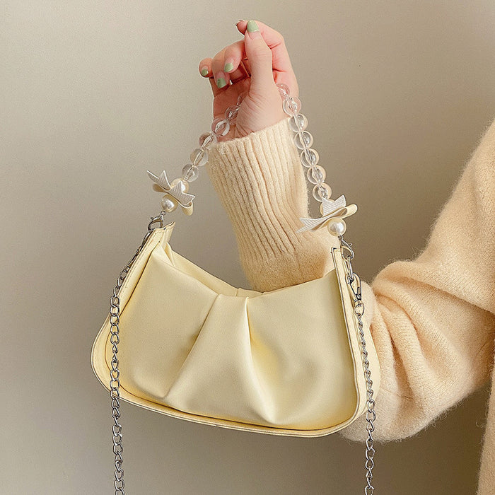 Wholesale Popular pleated new fashion pearl chain shoulder crossbody bag, saddle bag