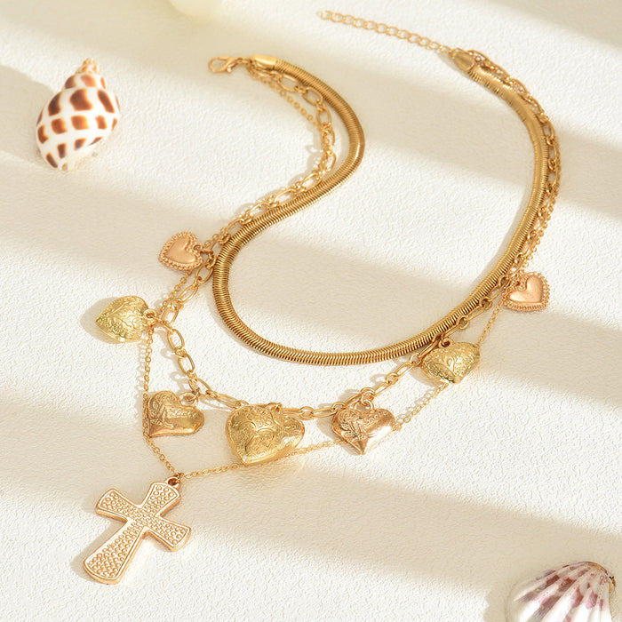 Wholesale Personalized cross pendant necklace, layered with heart-shaped collarbone chain, light luxury niche accessory