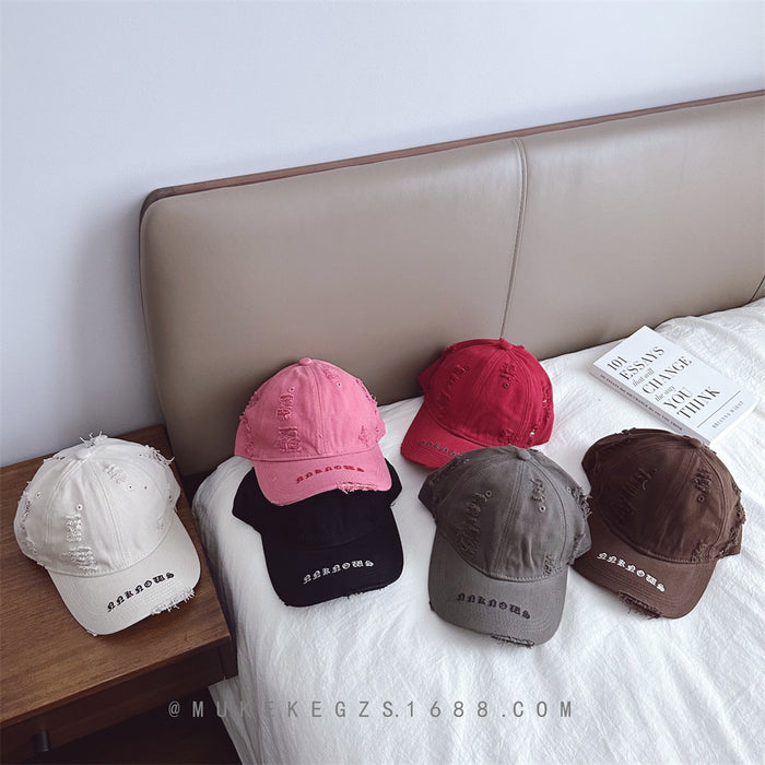 Wholesale Children's duckbill cap with worn holes, embroidered letters, fashionable sun shading baseball caps for boys and girls