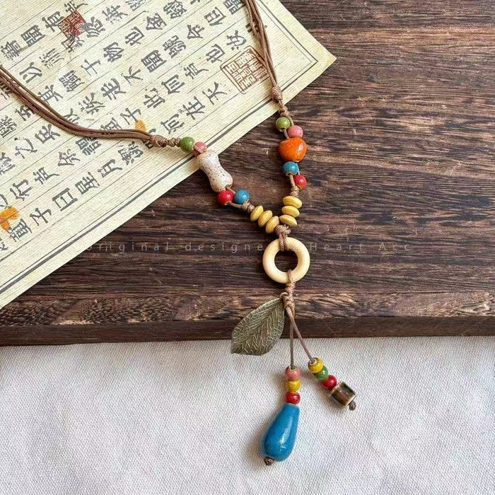 Wholesale Bohemian Vintage Style Long Chain Necklace Alloy Pendant Animal Design