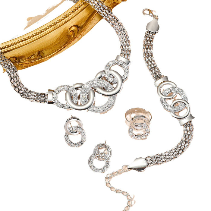 Wholesale Exquisite five piece set of fashionable jewelry for women, gorgeous rhinestone cross ring necklace, earrings, bracelet, ring set