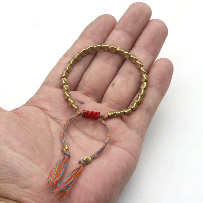 Wholesale Jewelry Hand Woven Adjustable Colorful Cotton Thread Threaded with Hidden Copper Twisted Flower Bead Bracelet Ethnic Style Hand Rope JDC-BT-SX010